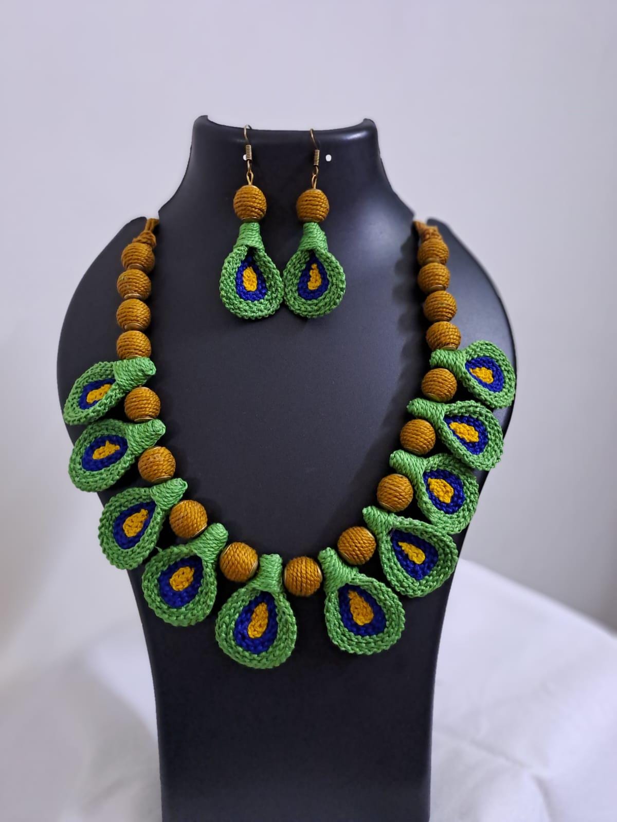 Green n yellow thread necklace with matching thread earrings.