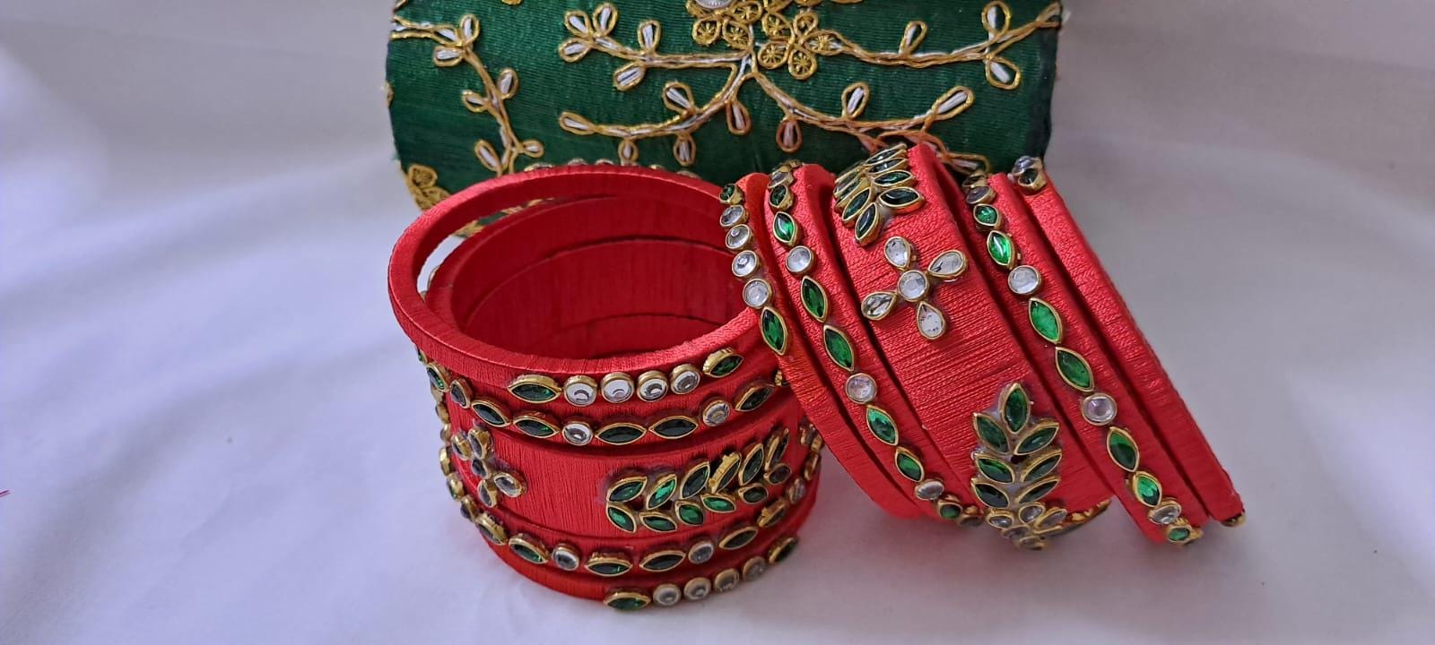 Red colour traditional thread kundan bangles with zari bangle box