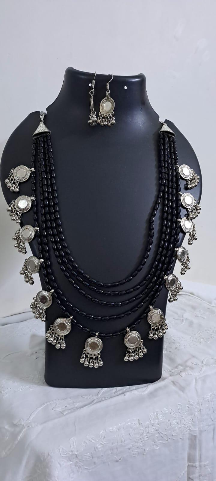 Exclusive multi layered  black glass beads necklace set with silver oxidised charms n matching earrings