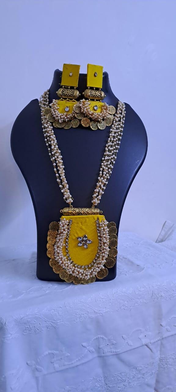 Exclusive Indian traditional yellow fabric necklace with laural beads and kundan n matching earrings