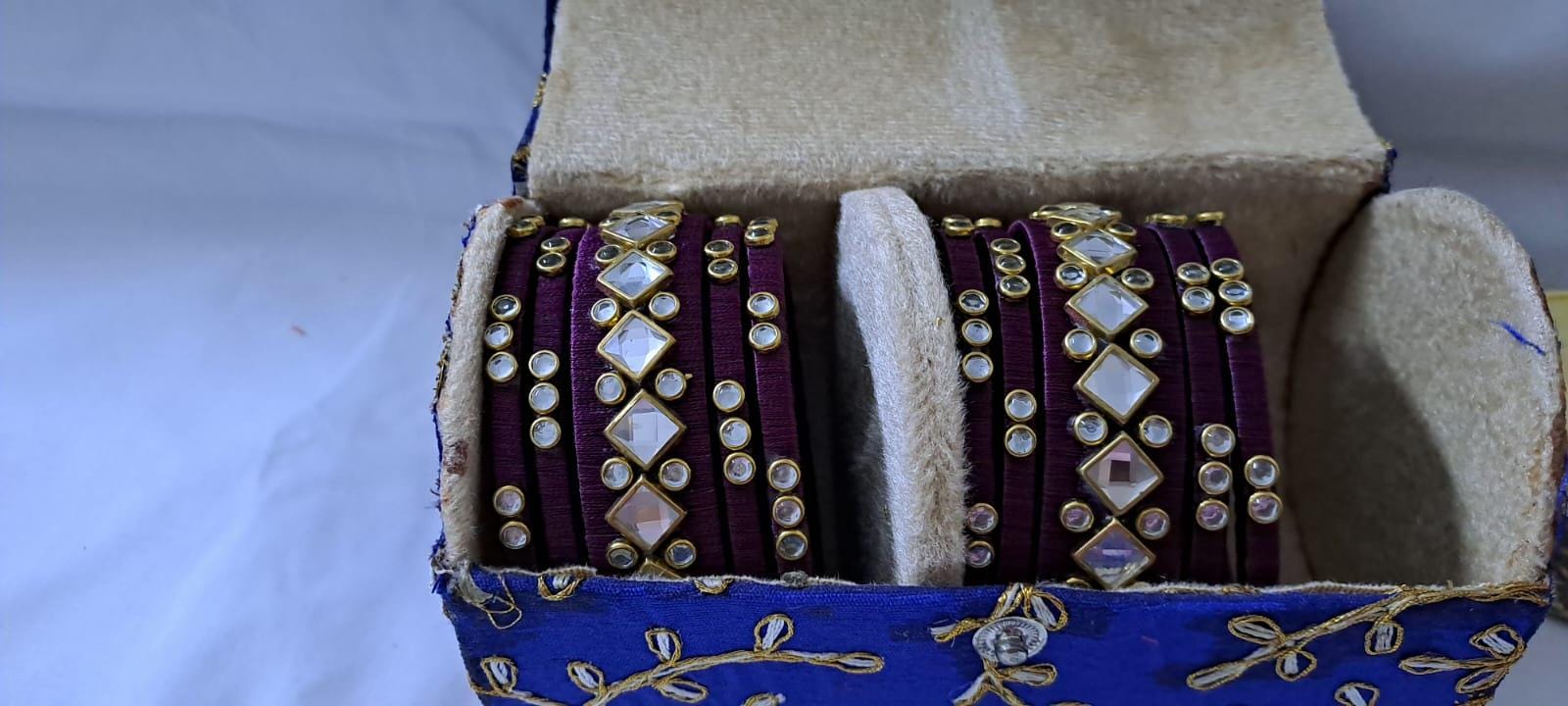 Purple colour traditional thread kundan bangles with zari bangle box