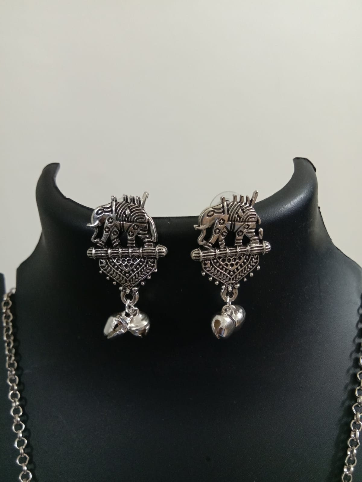 Oxidised silver chain with traditional pendant and matching earrings.