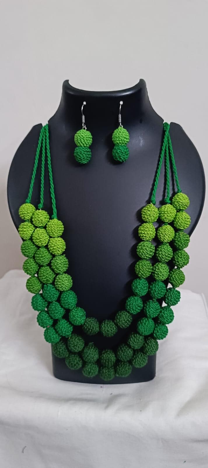 Exclusive 3 layered  green thread beads necklace set with matching earrings