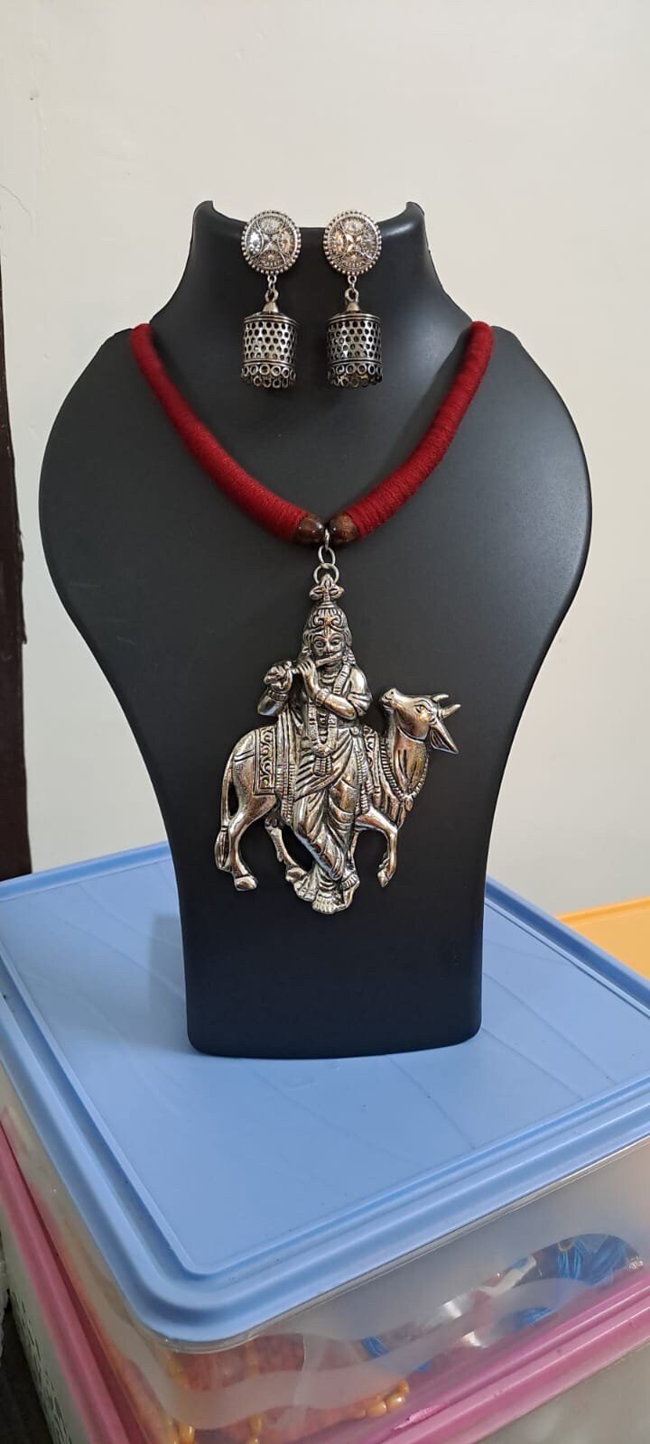 Red thread necklace with silver oxidised krishna pendant