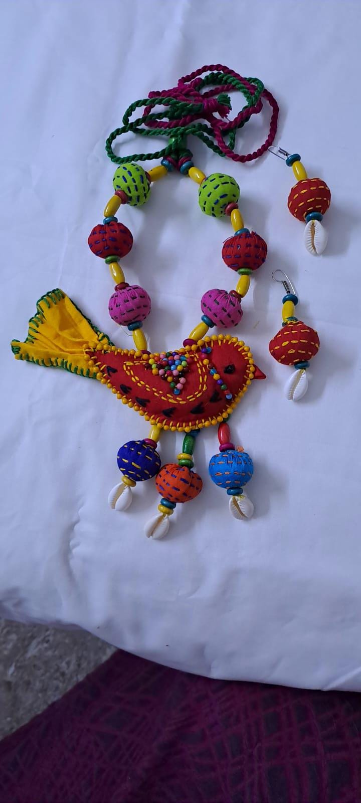 Exclusive fabric necklace with embroidered red fabric bird pendant and fabric beads n matching beads