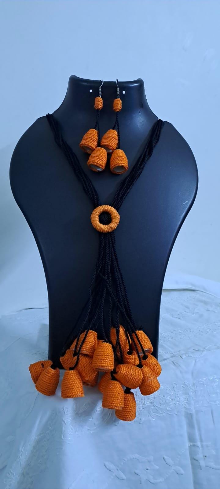 Orange thread necklace with multiple thread aparajita flower fringes n matching earrings