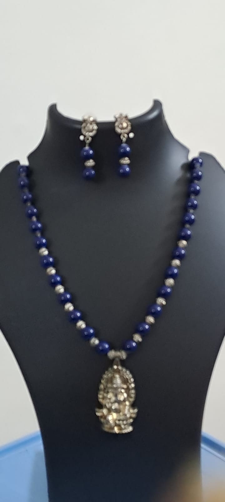 Blue glass beads necklace with oxidised silver ganesha pendant