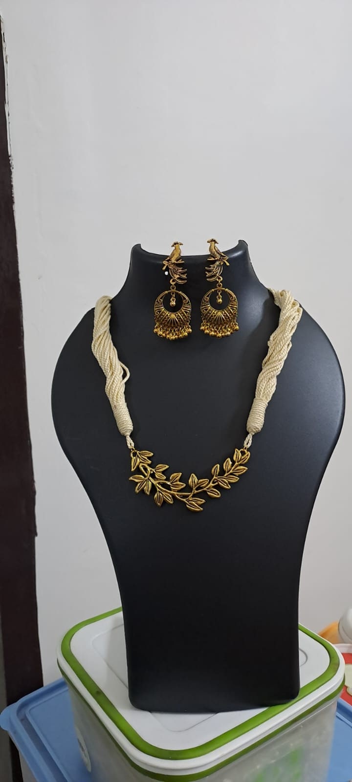 Off white thread necklace with Golden oxidised traditional pendant
