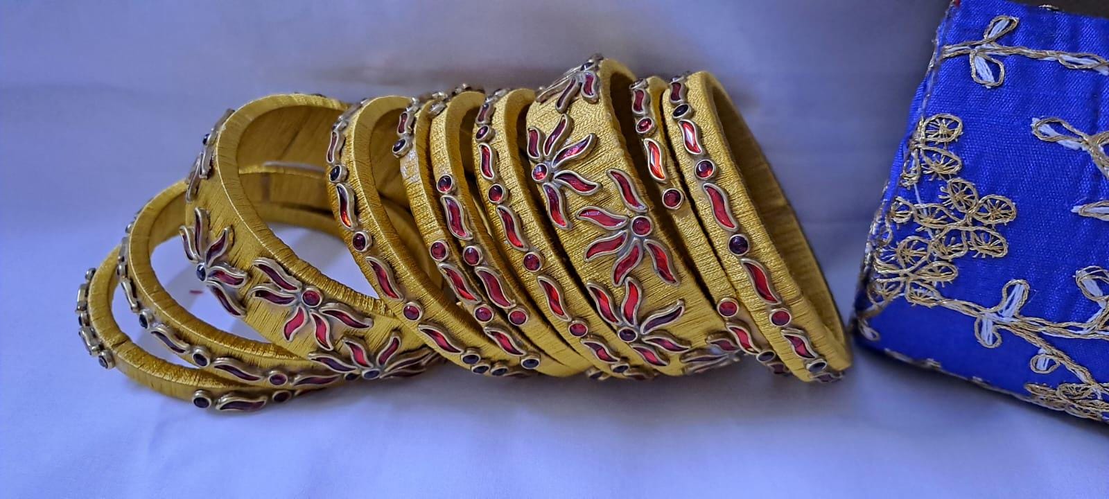 Golden colour traditional thread kundan bangles with zari bangle box