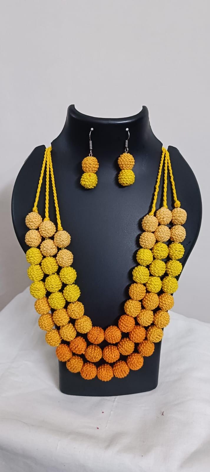 Exclusive 3 layered yellow thread beads necklace set with matching earrings