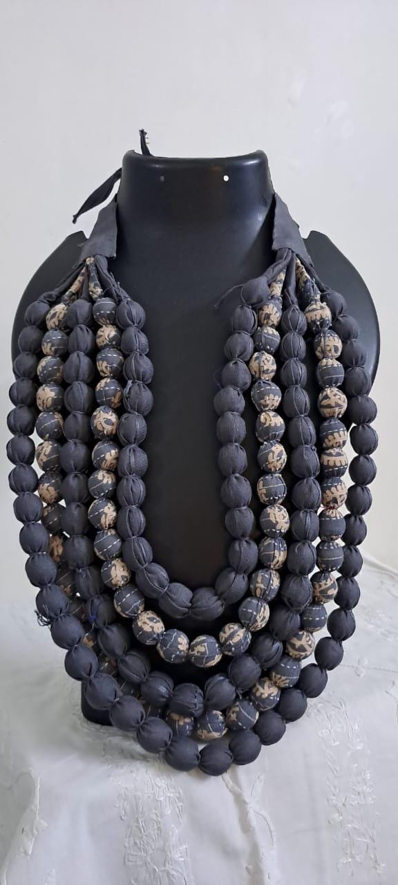 Exclusive multi-layered light grey fabric necklace