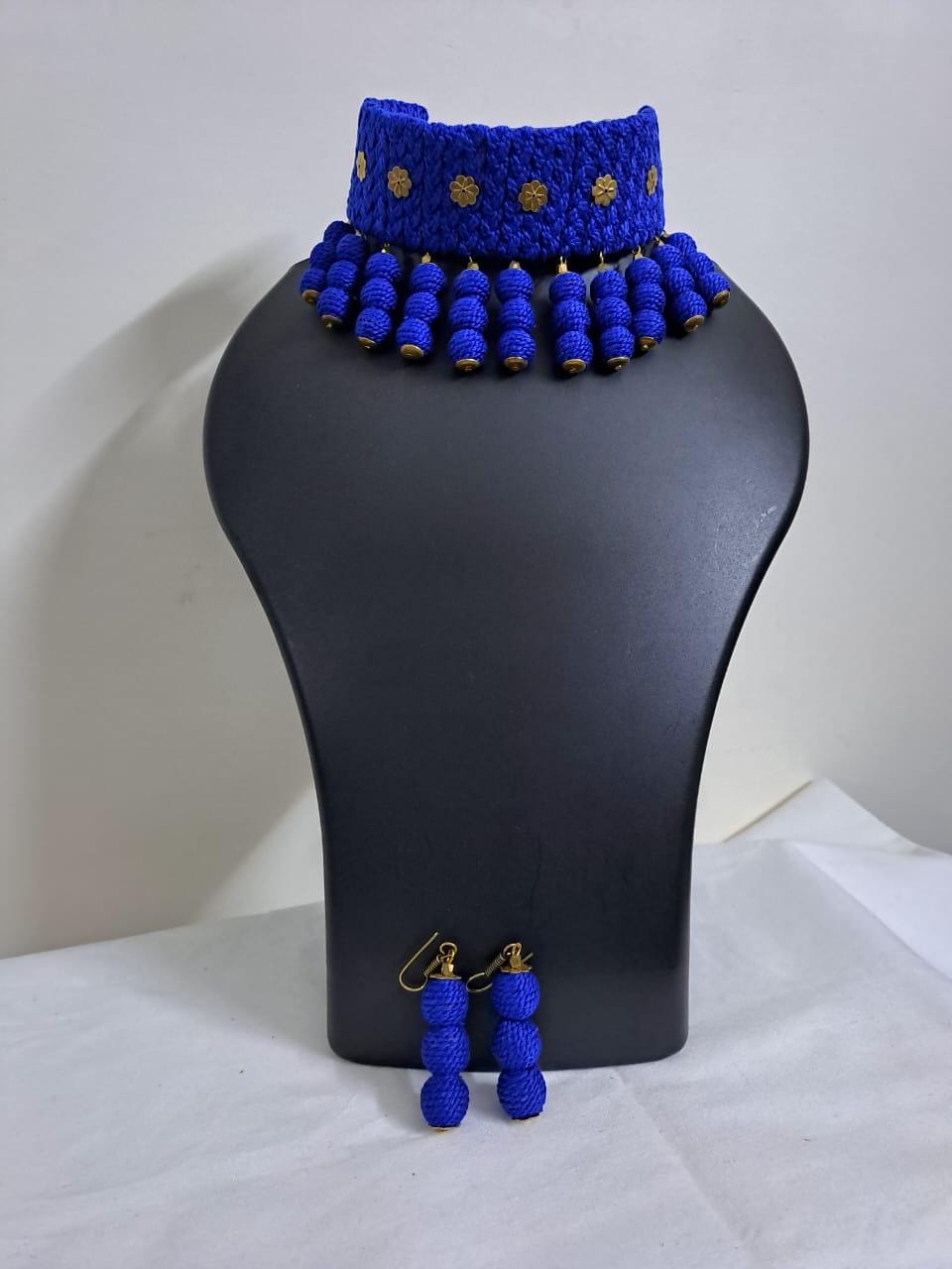 Blue braided choker necklace set with fringes and matching earrings