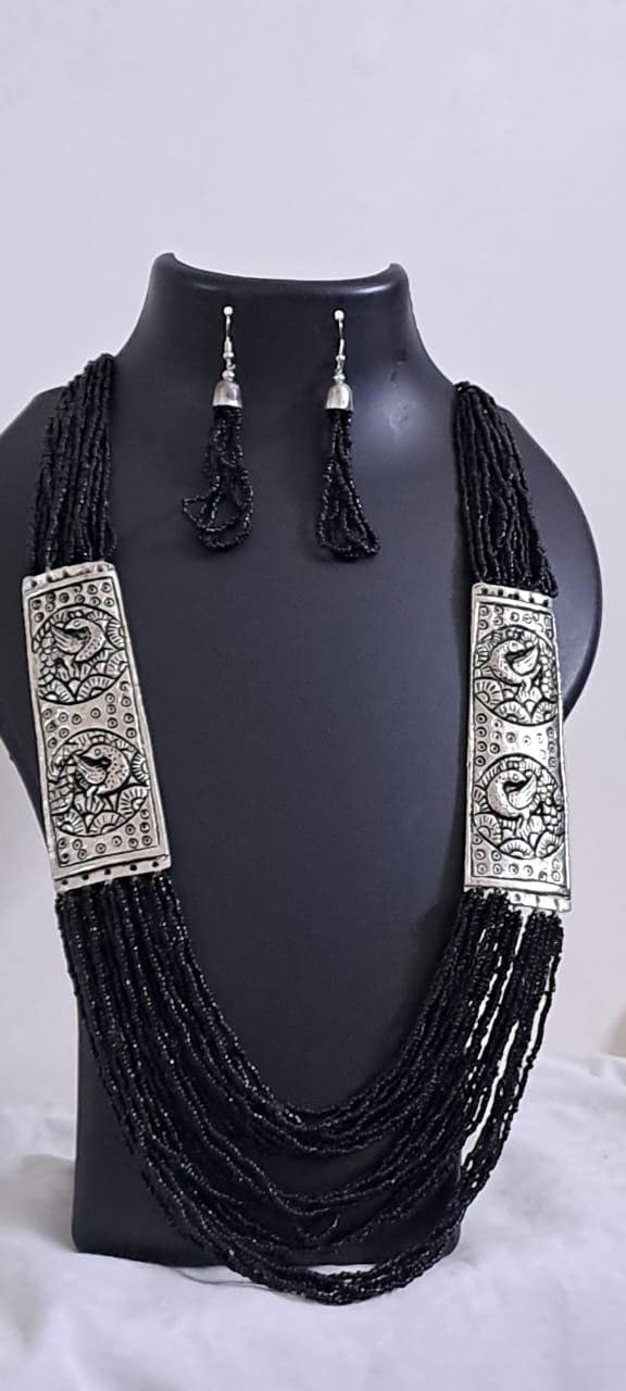 Exclusive silver oxidised set with layers of black seed beads n matching earrings