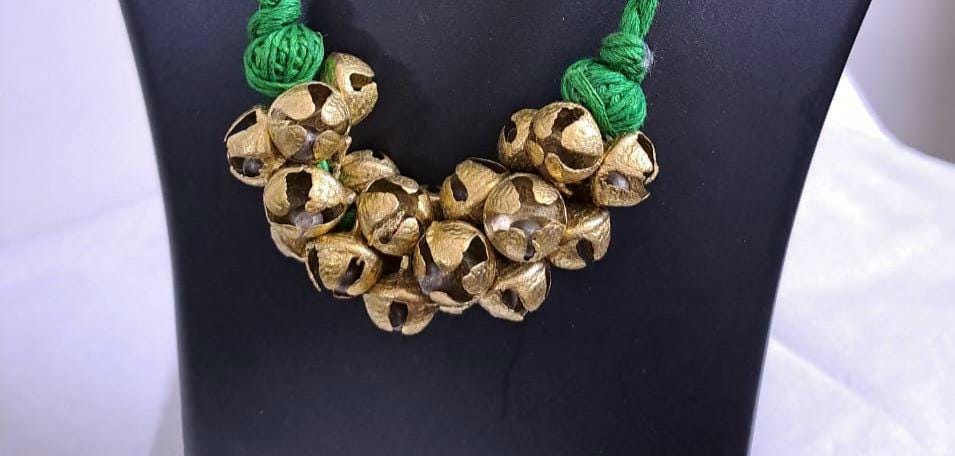 Green thread necklace set with trinkets n matching earrings