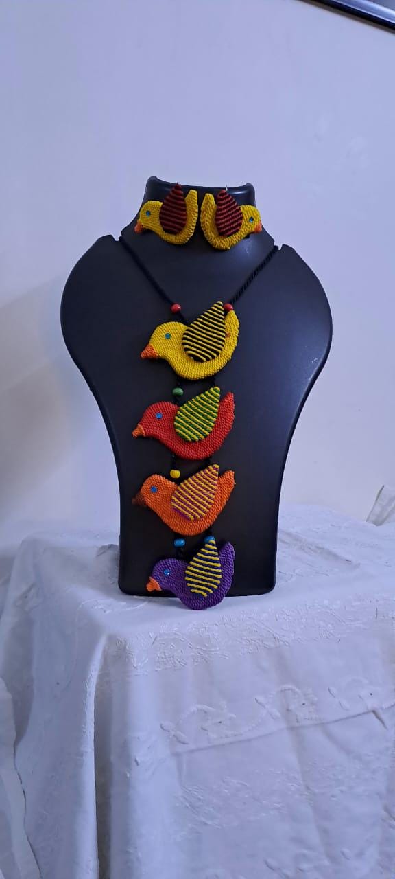 Multi coloured bird necklace and matching earrings