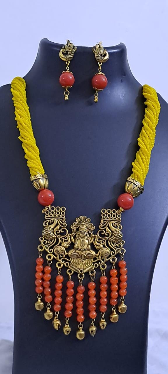 Exclusive multi layered  yellow glass seed beads necklace set with golden  oxidised pendant n earrings