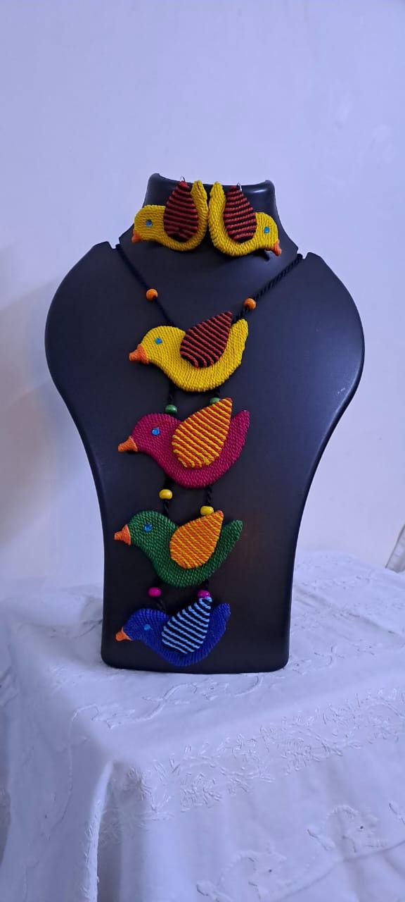 Multi coloured bird necklace and matching earrings