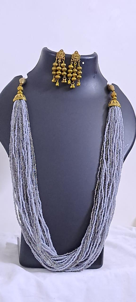 Exclusive multi layered  grey glass beads necklace set with golden oxidised matching earrings