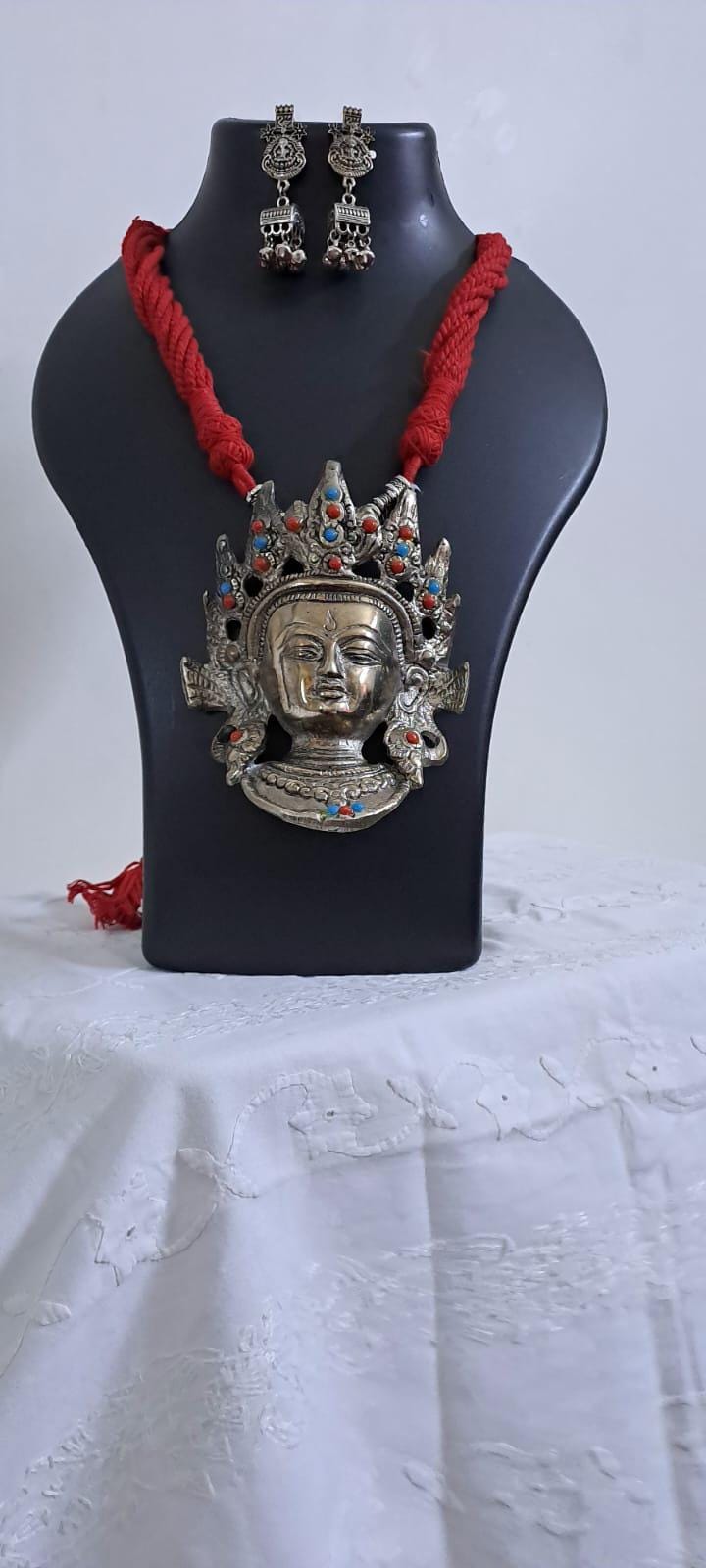 Maroon thread necklace with oxidised silver durga pendant