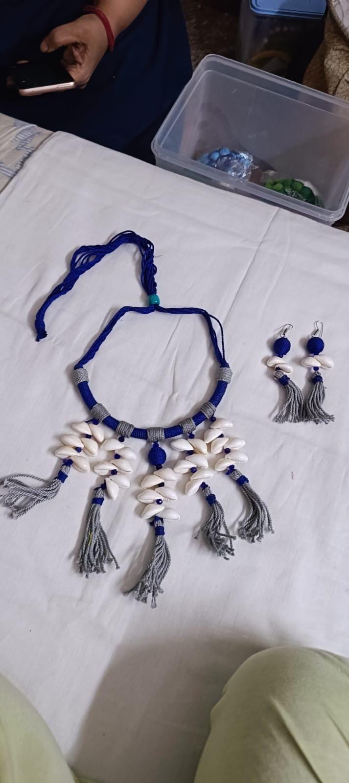 Exclusive blue n grey hasuli thread necklace set with shell fringes n matching earrings