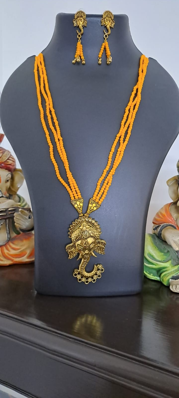Orange seed beads necklace with Lord Ganesha pendant