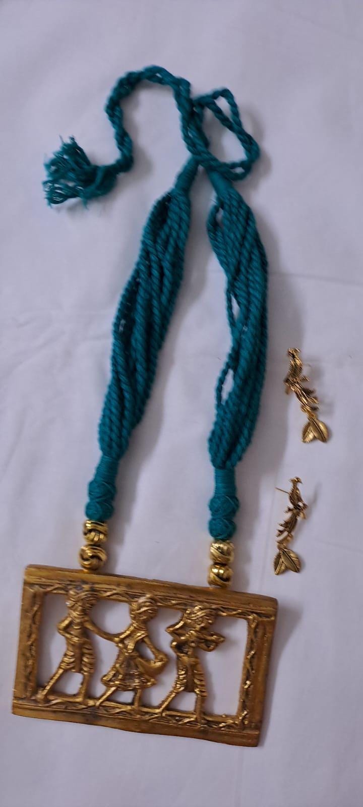 Sea green thread necklace set with dokra pendant n matching earrings