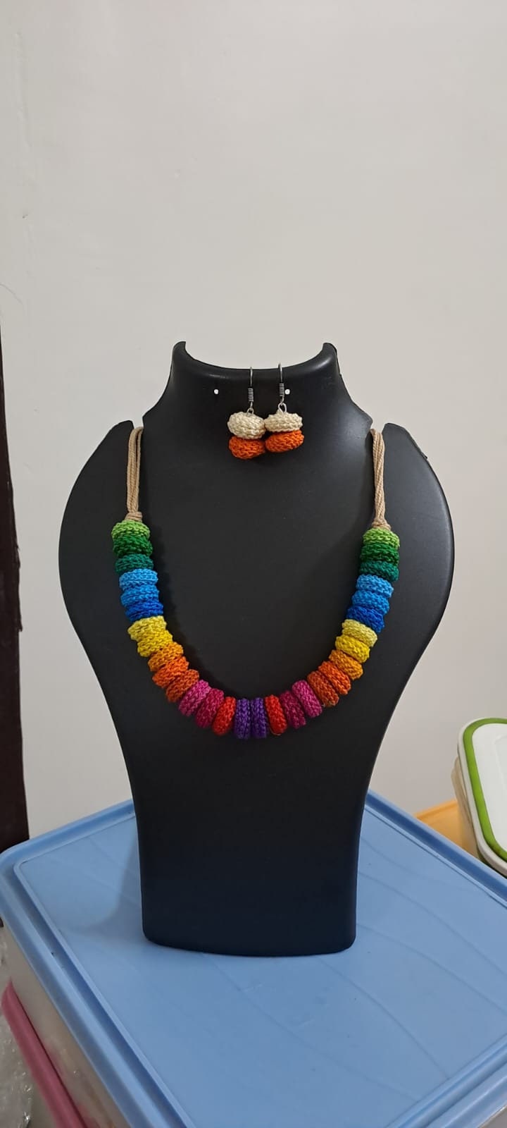 Exclusive multi coloured crochet necklace with colouful matching earrings.