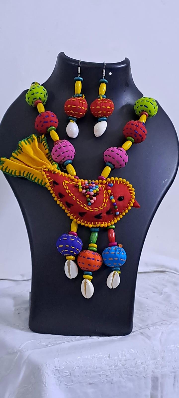 Exclusive fabric necklace with embroidered red fabric bird pendant and fabric beads n matching beads