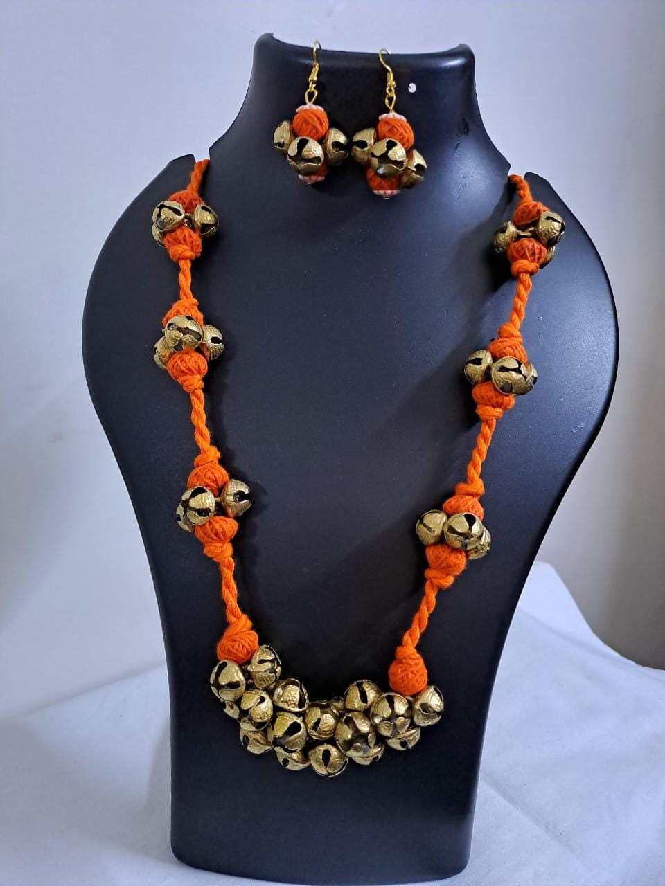 Orang thread necklace set with trinkets n matching earrings