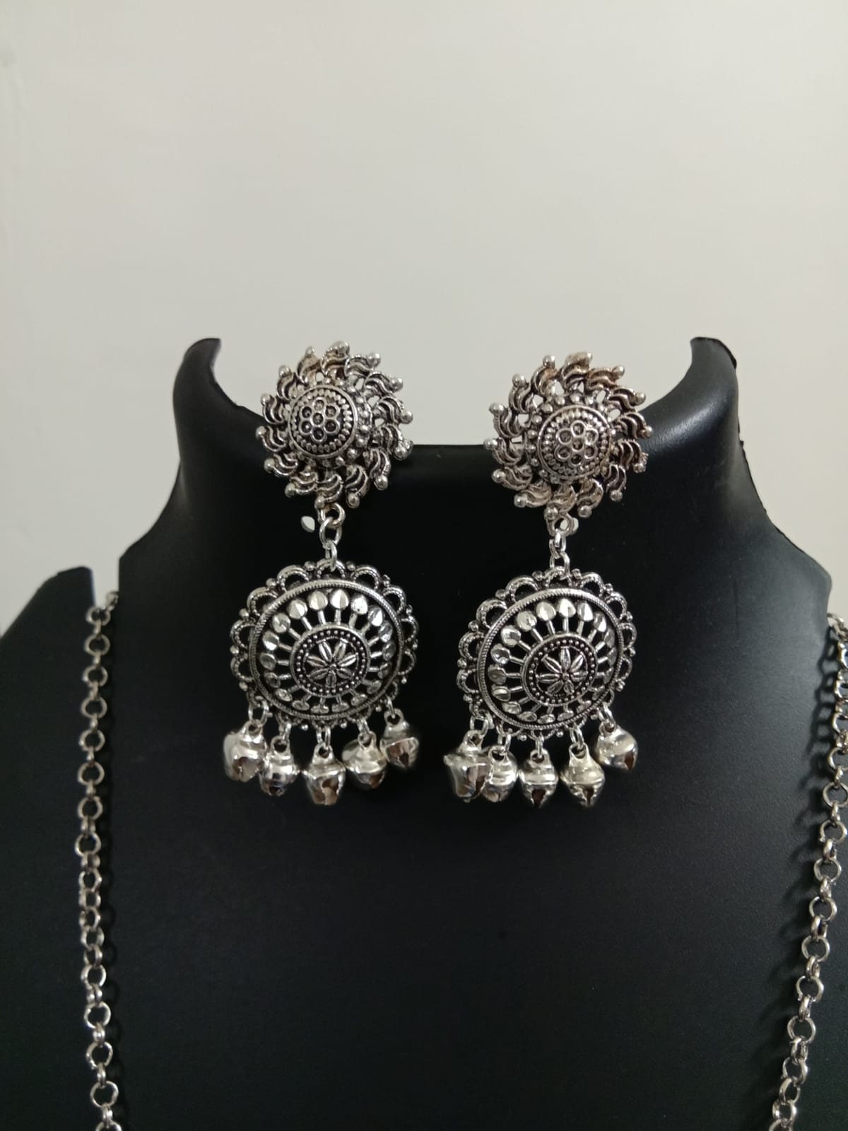 Oxidised silver chain with traditional pendant and matching earrings.