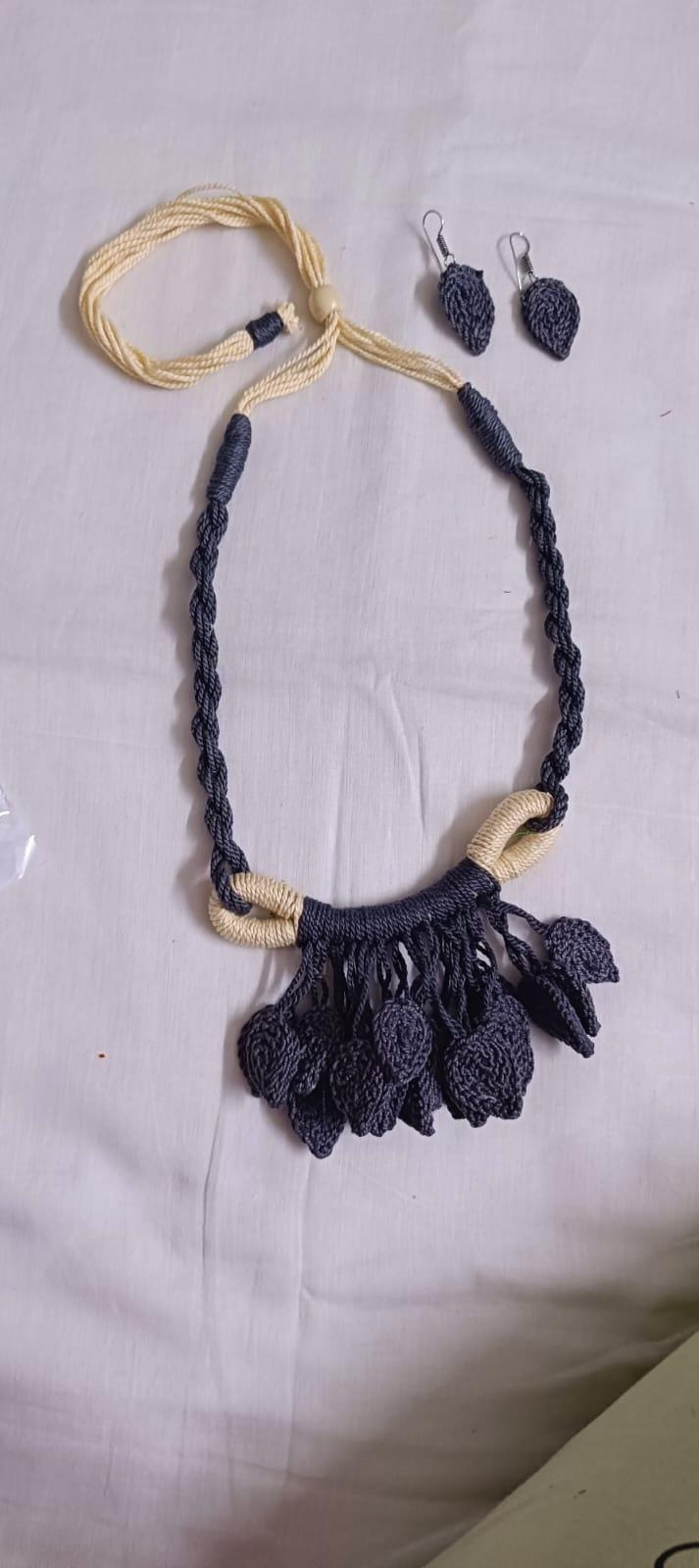 Grey Crochet thread necklace set with leaf fringes and matching earrings