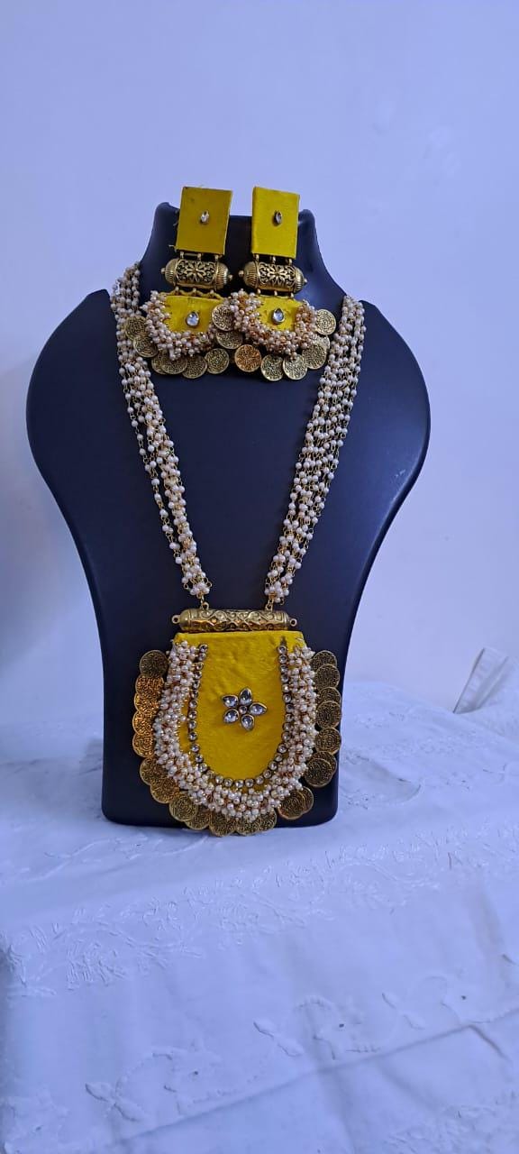 Exclusive Indian traditional yellow fabric necklace with laural beads and kundan n matching earrings