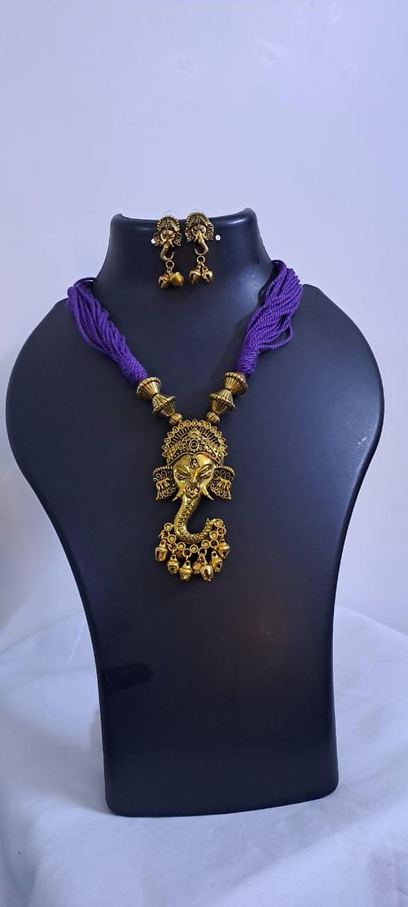 Purple thread necklace with Golden oxidised traditional pendant