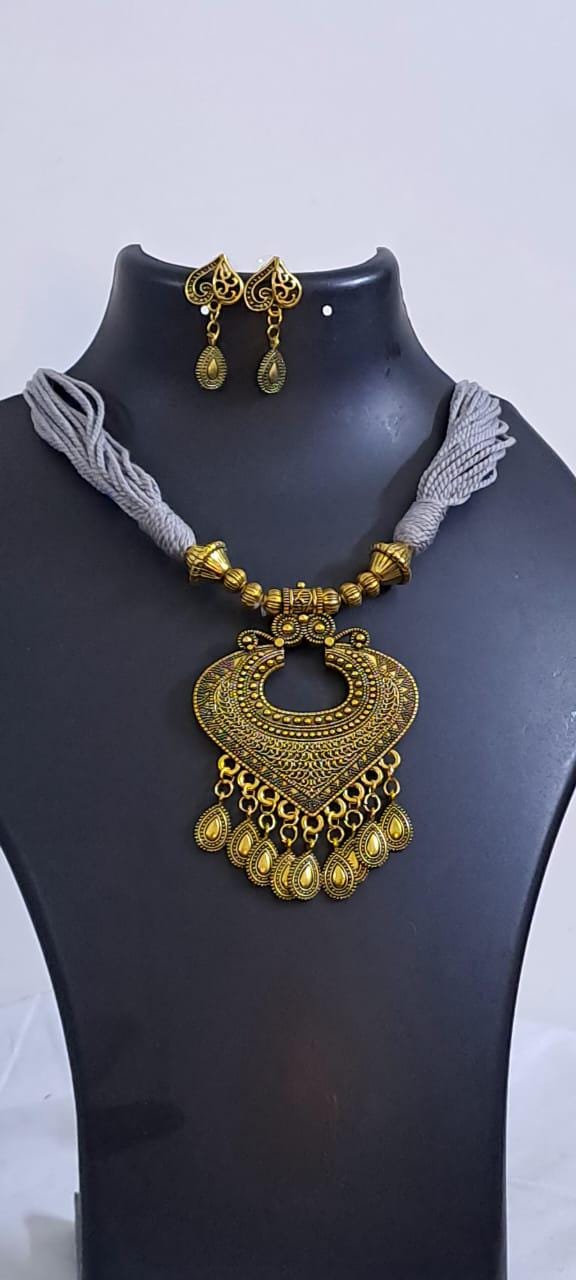 Grey thread necklace with Golden oxidised traditional pendant