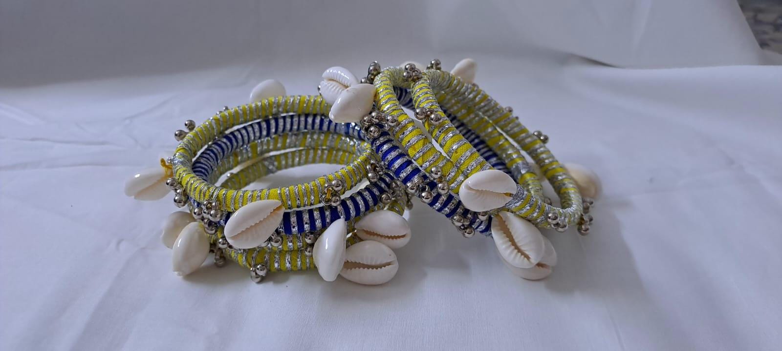 Yellow and blue colour traditional zari thread and kori bangles (set of 7 bangles)