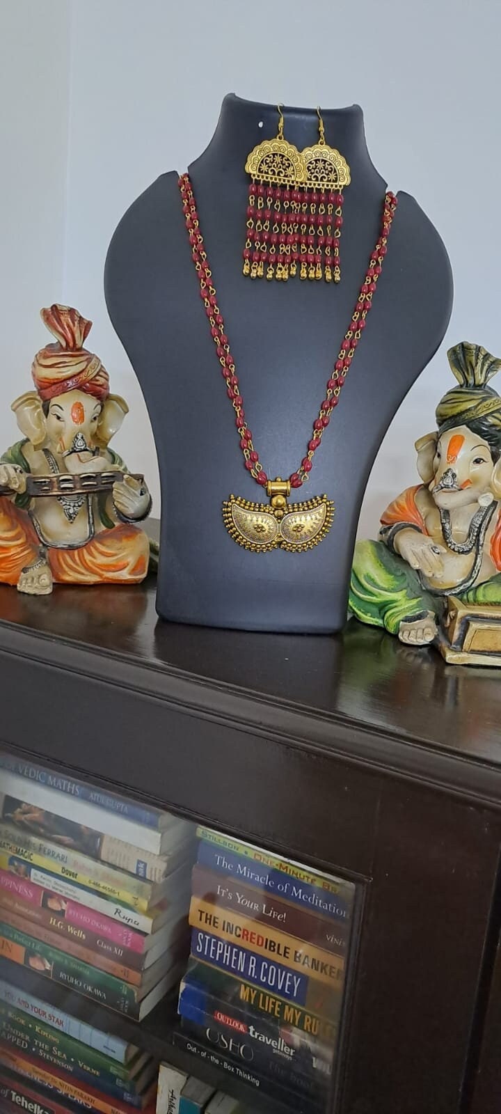 Red beads necklace with golden oxidised pendant
