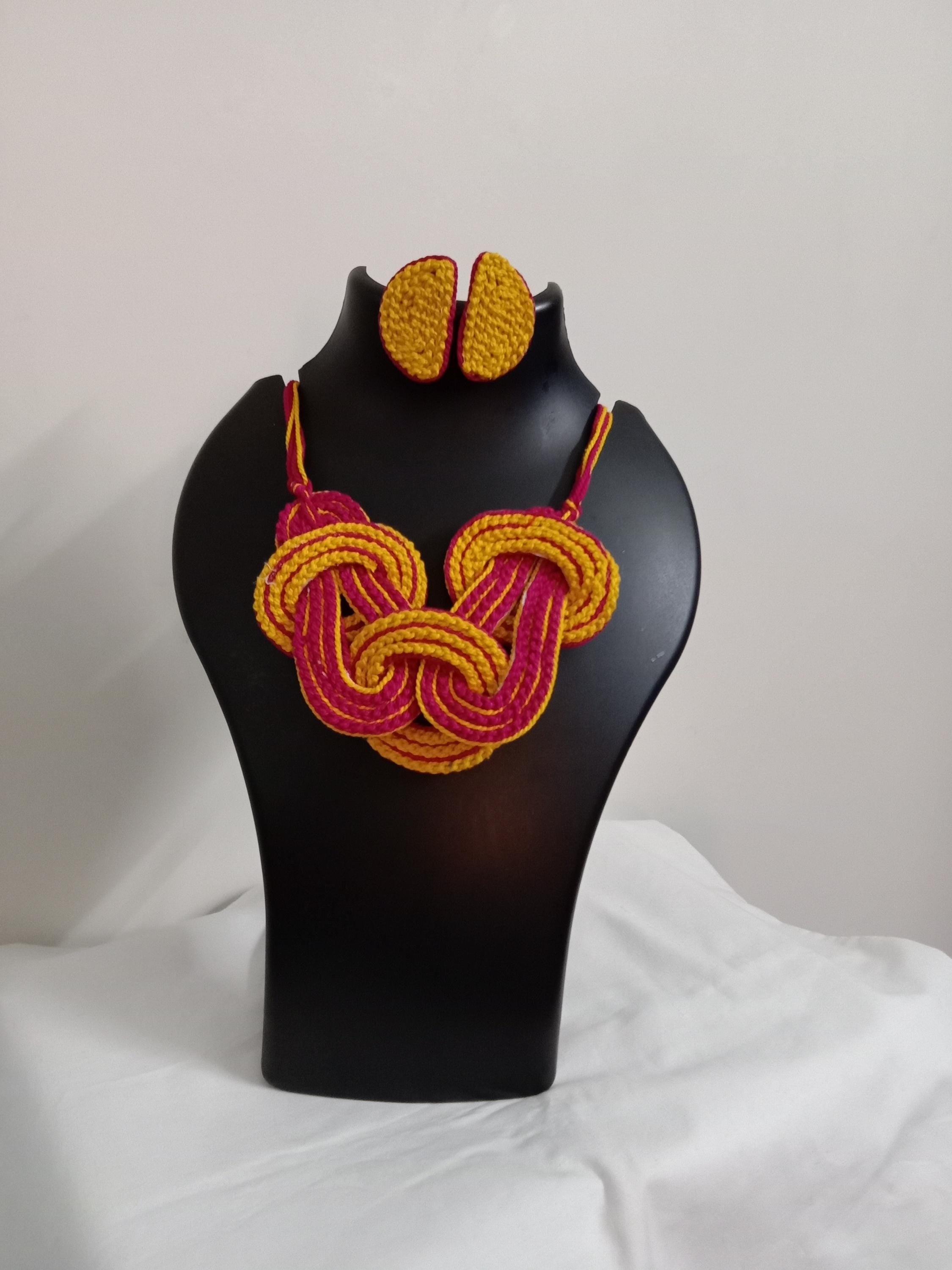 Celtic knot thread necklace with matching thread earrings.