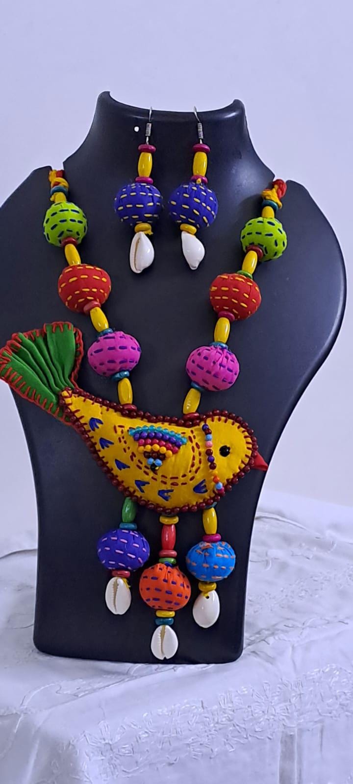 Exclusive fabric necklace with embroidered yellow fabric bird pendant and fabric beads n matching beads