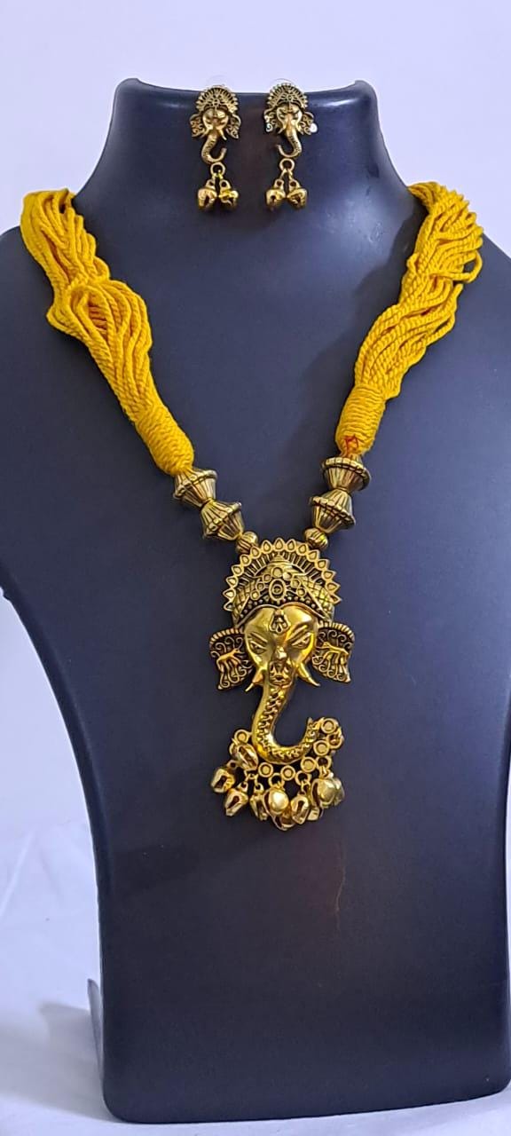 Yellow thread necklace with Golden oxidised traditional pendant