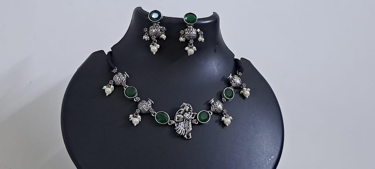 Exclusive silver oxidised lstone necklace with radha krishna pendant with matching earrings