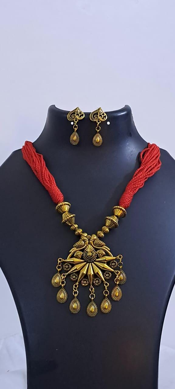 Red thread necklace with Golden oxidised traditional pendant