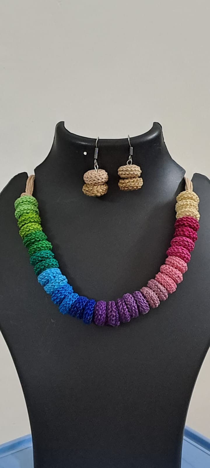 Exclusive multi coloured crochet necklace with colouful matching earrings.
