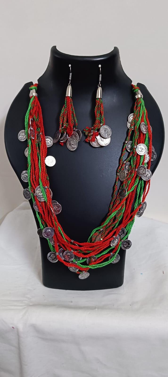Exclusive multi-coloured and multi-layered thread necklace with silver oxidised charms