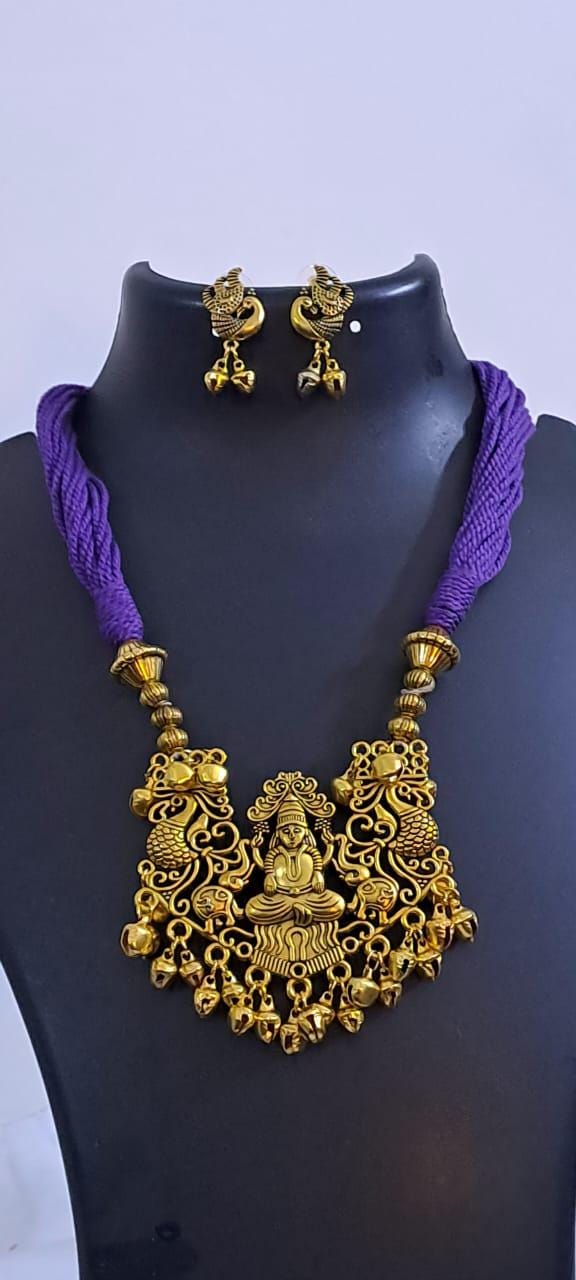 Purple thread necklace with Golden oxidised traditional pendant