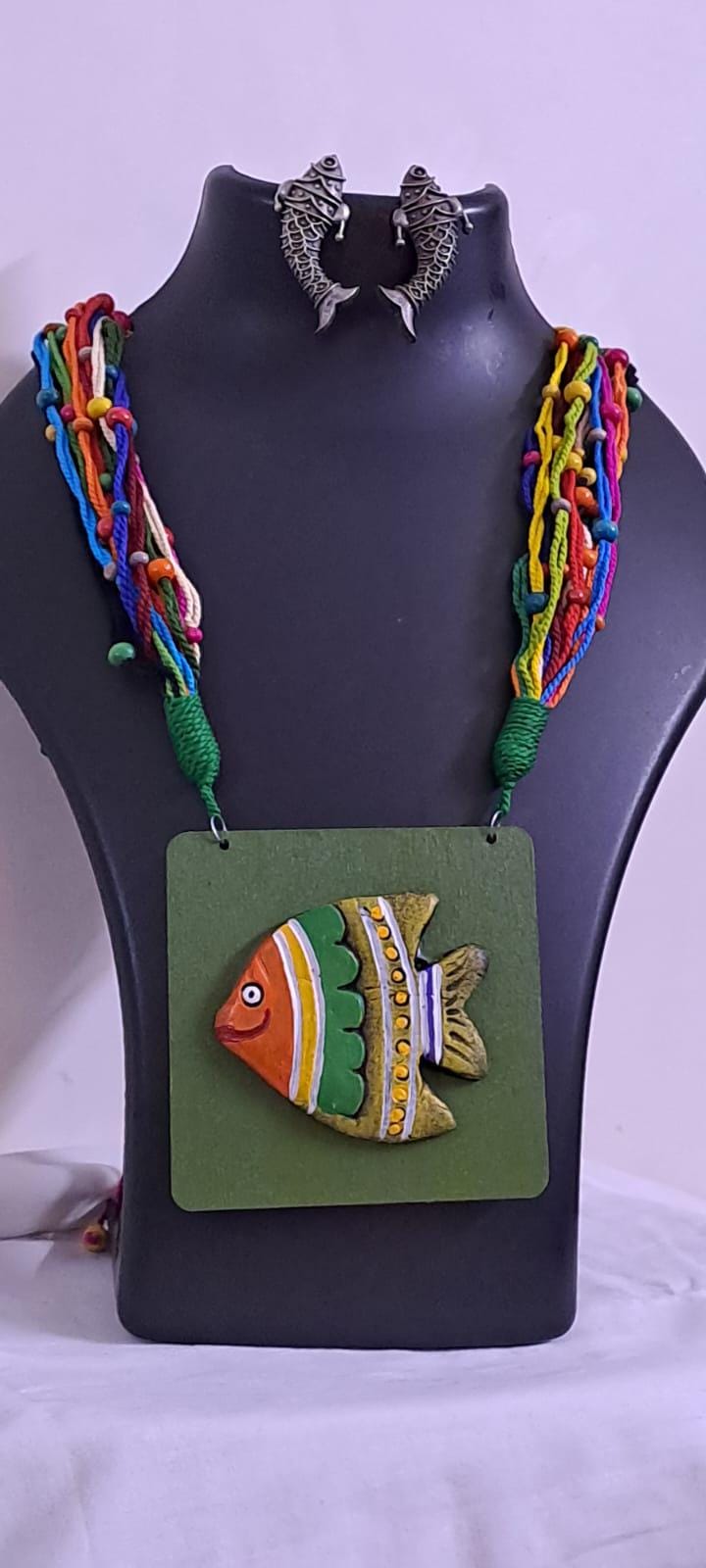 Terracotta fish pendant and thread necklace