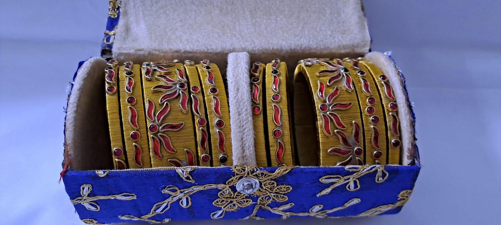 Golden colour traditional thread kundan bangles with zari bangle box