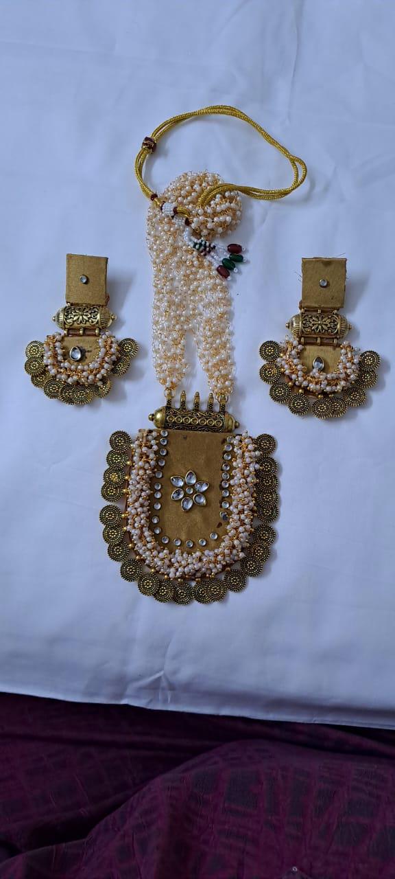 Exclusive Indian traditional golden fabric necklace with laural beads and kundan n matching earrings