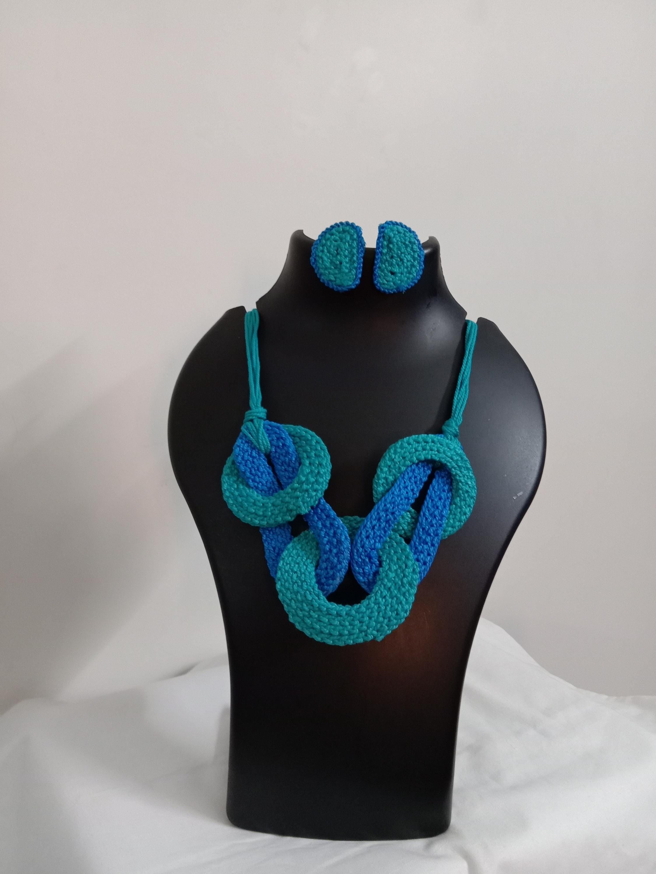 Celtic knot thread necklace with matching thread earrings.