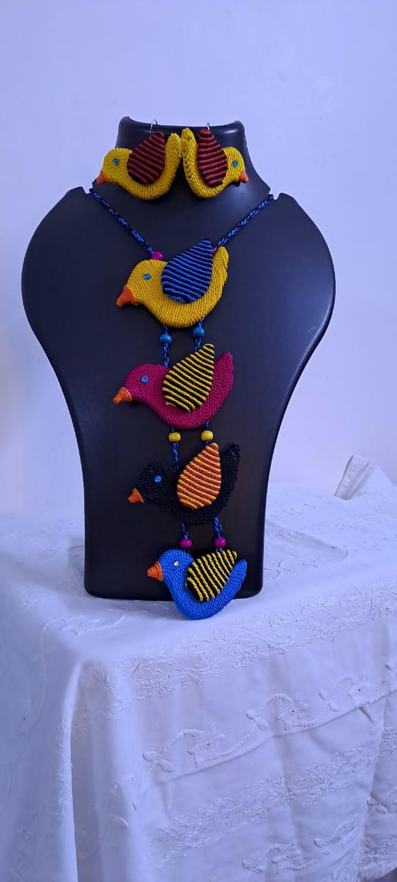 Multi coloured bird necklace and matching earrings