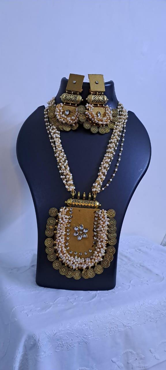 Exclusive Indian traditional golden fabric necklace with laural beads and kundan n matching earrings